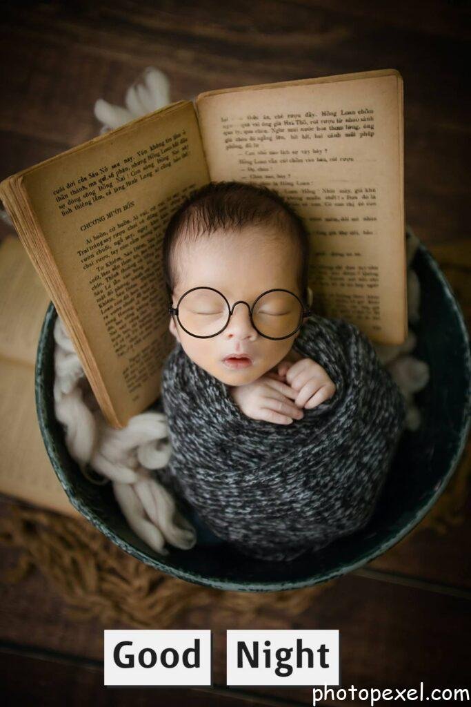 A-Baby-Wearing-Eyeglasses-While-Sleeping-Good-Night-Images