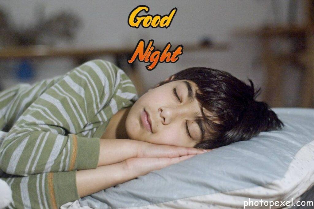 A-Boy-In-Green-And-Gray-Stripe-Shirt-Sleeping-Good-Night-Images