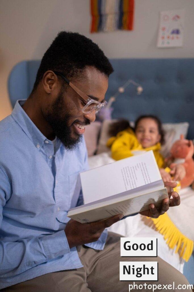 A-Father-Reading-Bedtime-Story-To-His-Daughter-Good-Night-Images