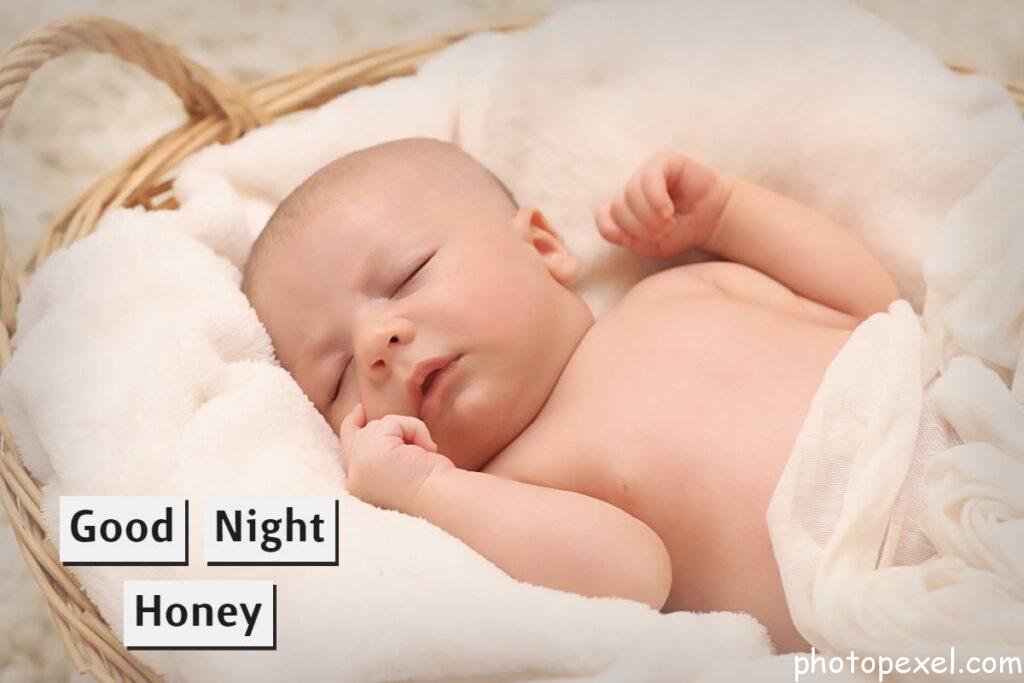 Baby-Sleeping-On-White-Cotton-Good-Night-Images