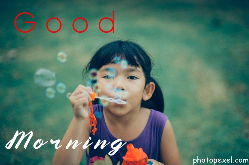 Close-Up-Portrait-Of-A-Girl-With-Soap-Bubbles-Good-Morning-Images