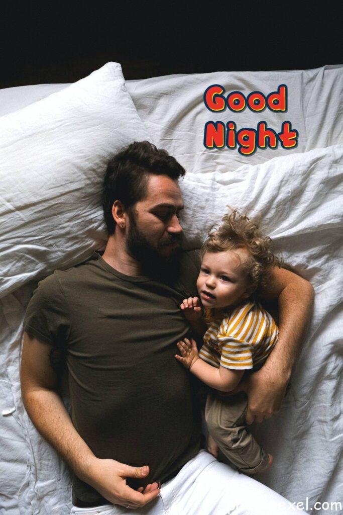 Man-And-Son-Lying-In-Bed-Good-Night-Images