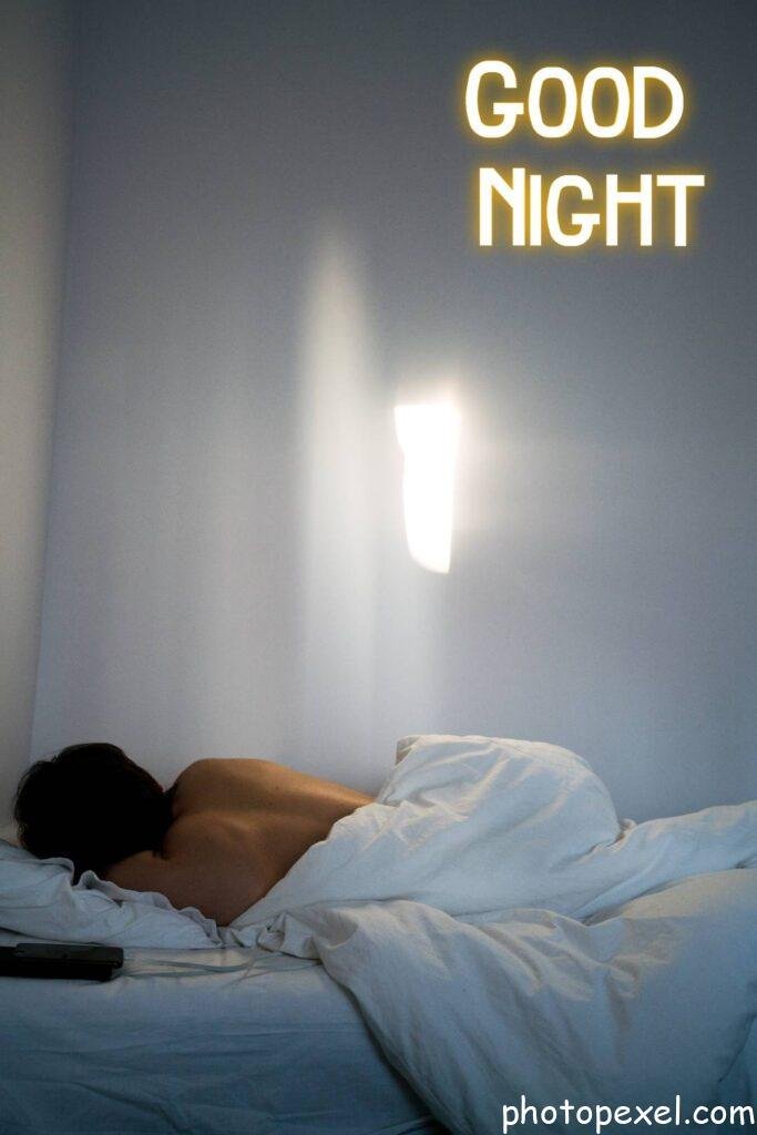 Unrecognizable-Person-With-Bare-Back-Sleeping-In-Bed-Good-Night-Images