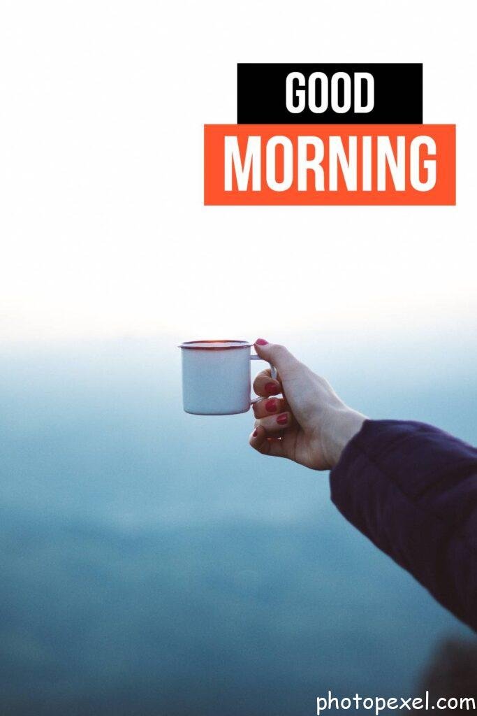 Woman-Holding-White-Mug-Good-Morning-Images