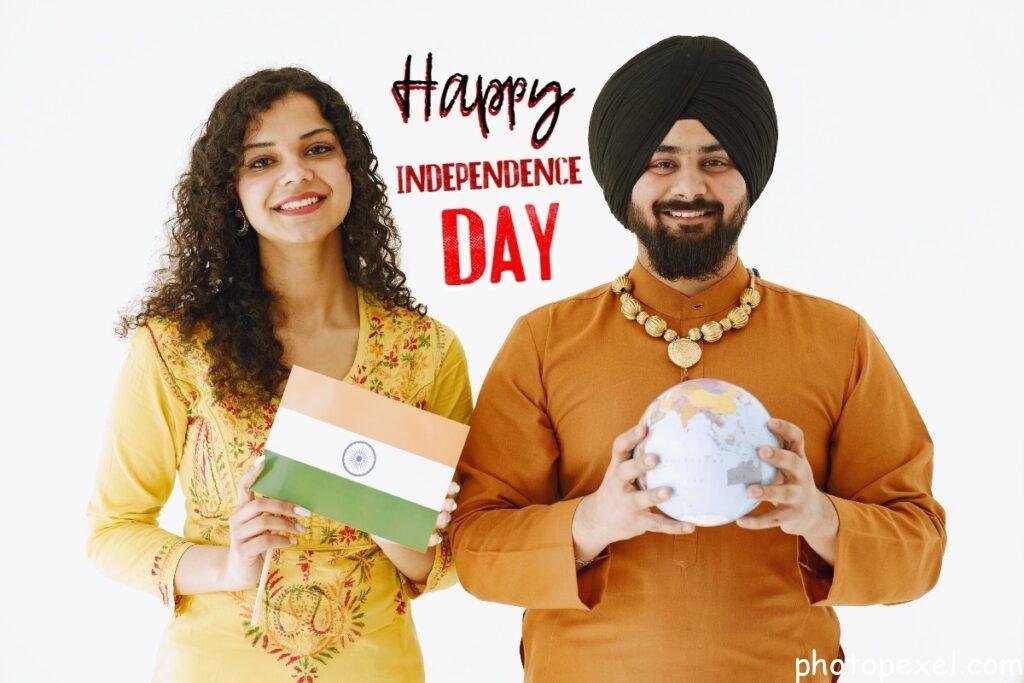 A-Man-And-Woman-Holding-A-Globe-And-A-Flag-Happy-Independence-Day-Images