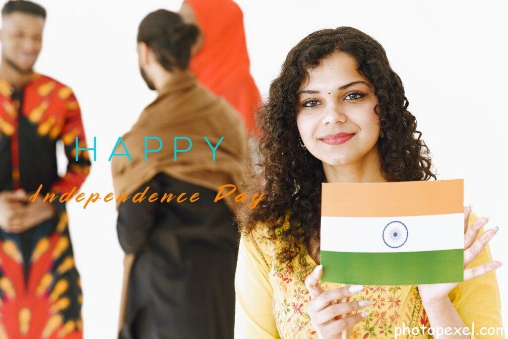 Group-Of-People-With-Smiling-Young-Woman-Holding-India-Flag-Happy-Independence-Day-Images