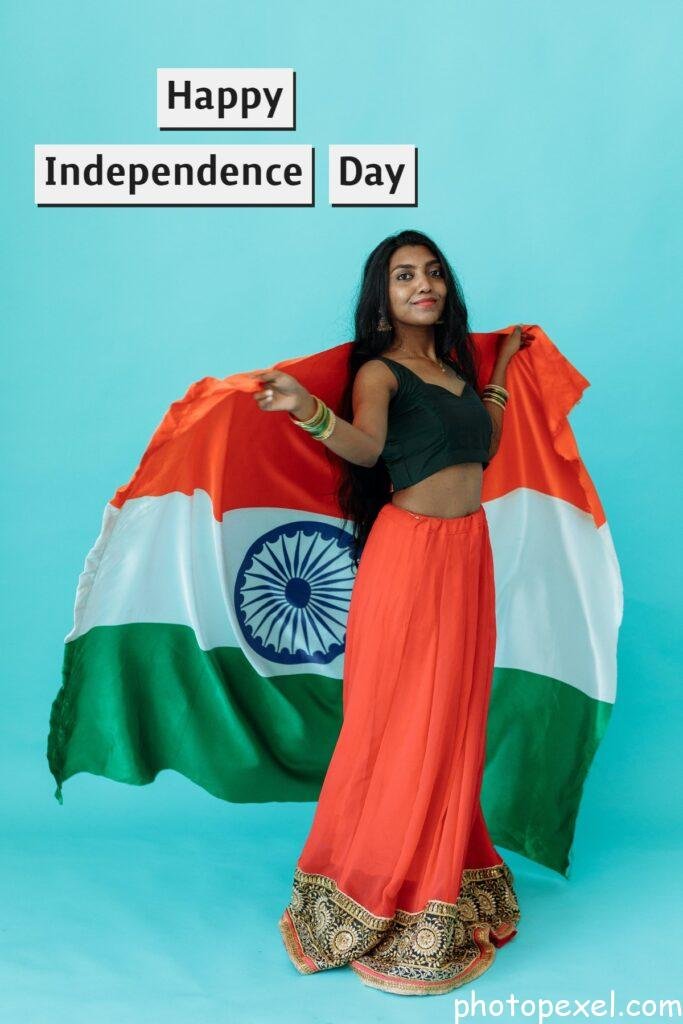 Photo-Of-Woman-Holding-A-Flag-Happy-Independence-Day-Images