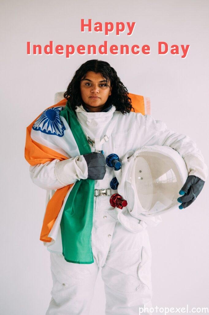 Woman-In-An-Astronaut-Costume-Holding-A-Flag-Happy-Independence-Day-Image