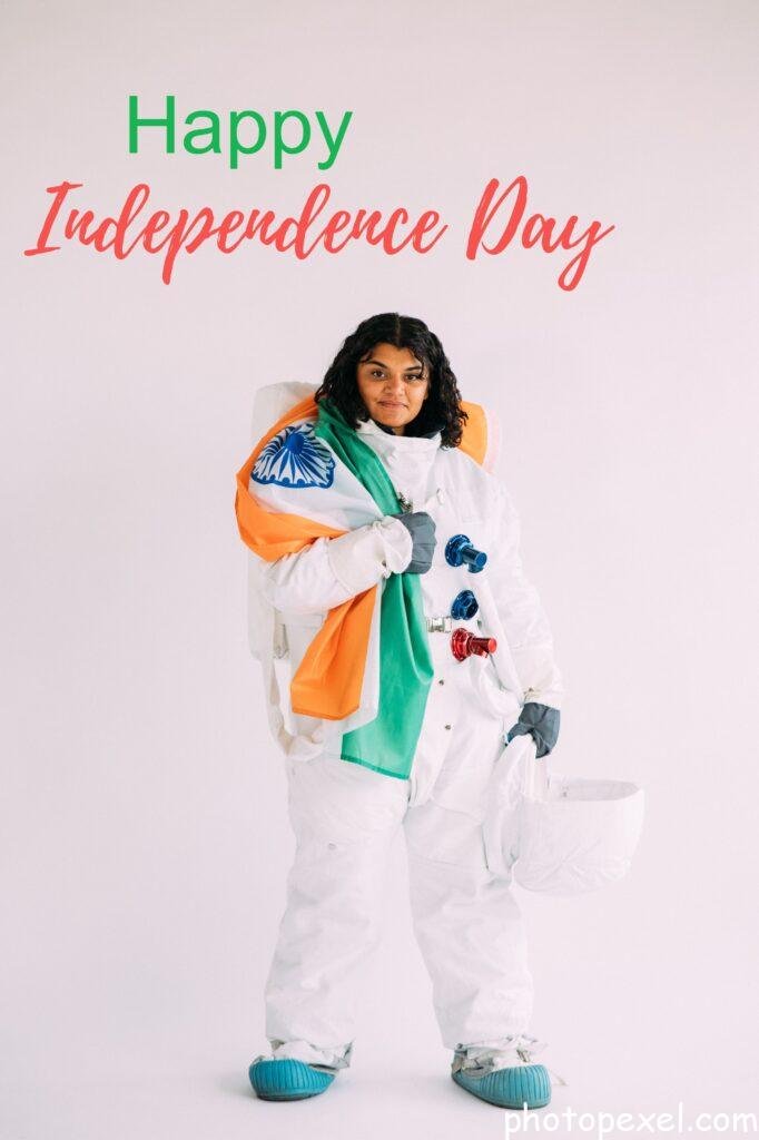 Woman-Wearing-An-Astronaut-Costume-Holding-A-Flag-Happy-Independence-Day-Images