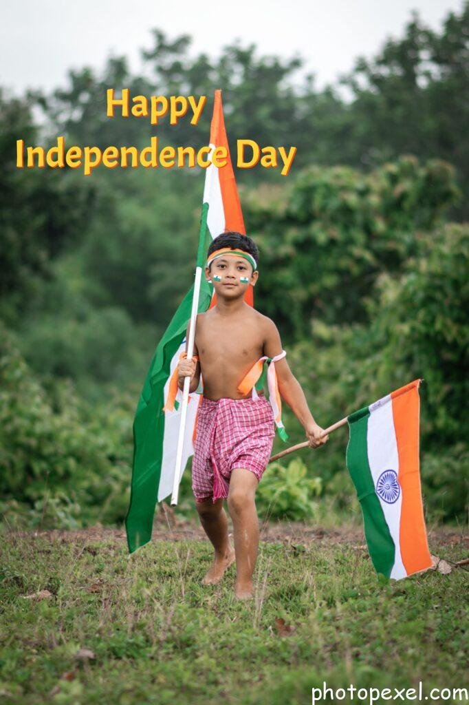 Kid-Holding-Two-Indian-Flags-Happy-Independence-Day-Images